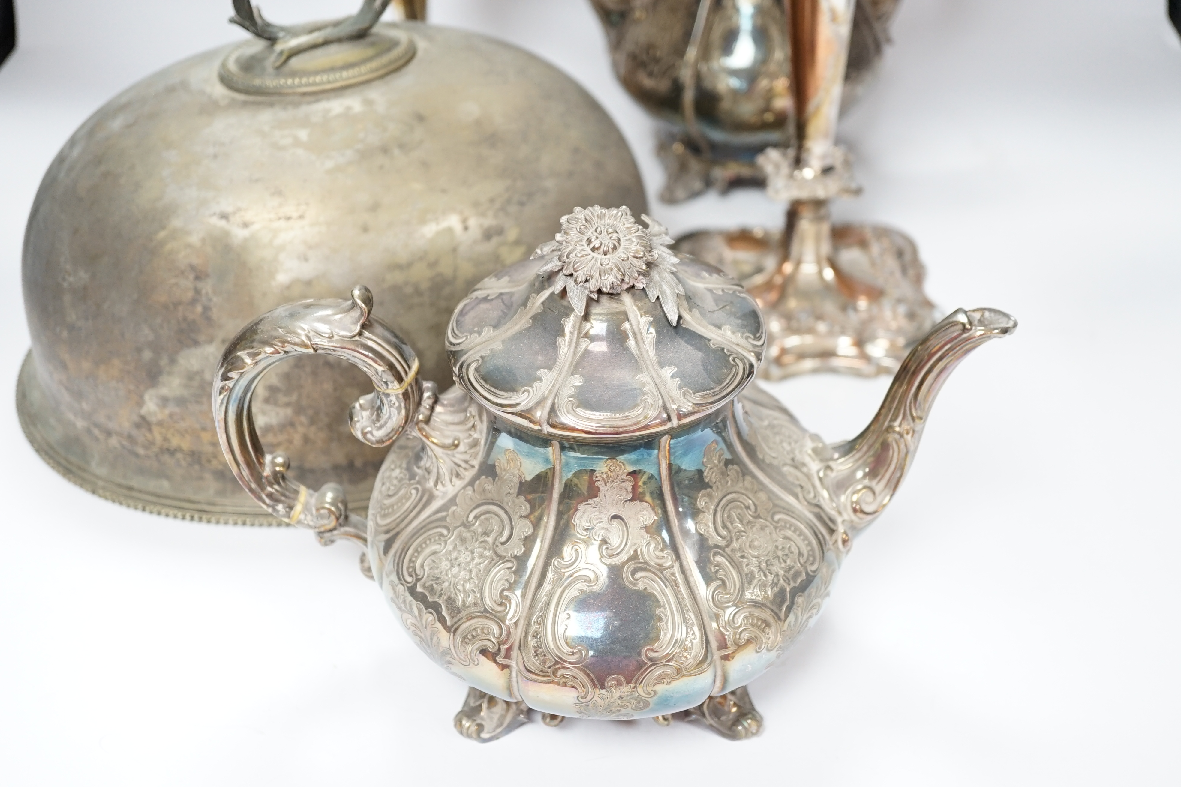 A quantity of silver plated wares to include a three piece tea set, tureen cover and pair of candelabra, 42cm CITES Submission reference S7EVMP55